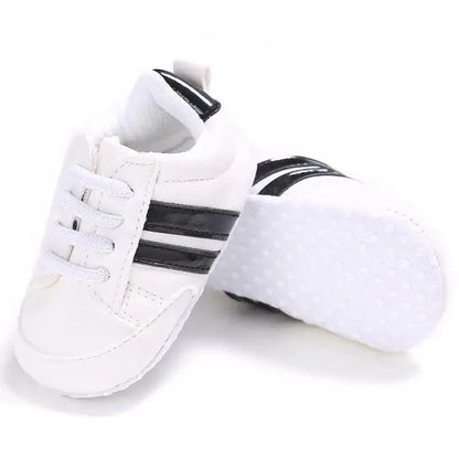 Stevvex baby sneakers white PU leather with black side stripes, lace-up soft sole pair on Tampa Home & Garden Store