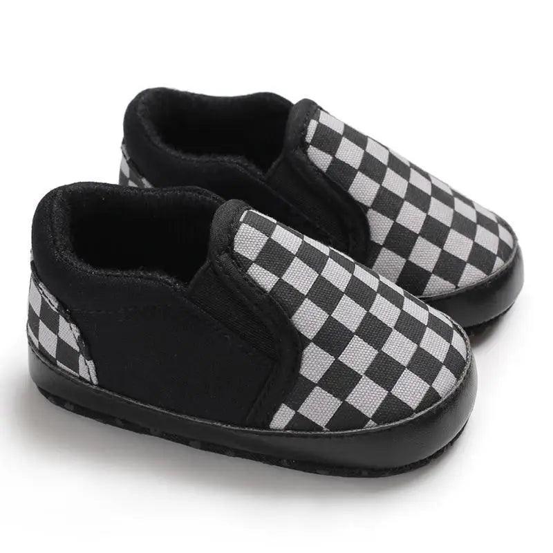 Stevvex baby shoes pair black and white checkerboard PU leather slip-ons with soft sole on Tampa Home & Garden Store