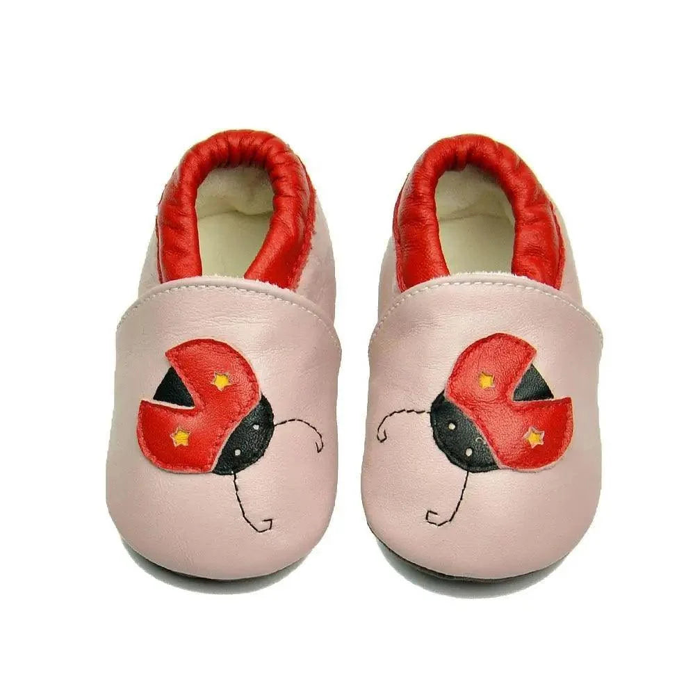 Baby leather newborn booties Stevvex pink with red inner lining butterfly motif pair on Tampa Home & Garden Store