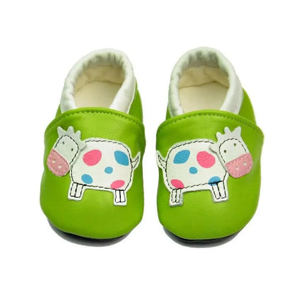 Green leather baby moccasin booties with cow applique by Stevvex newborn shoes pair on Tampa Home & Garden Store
