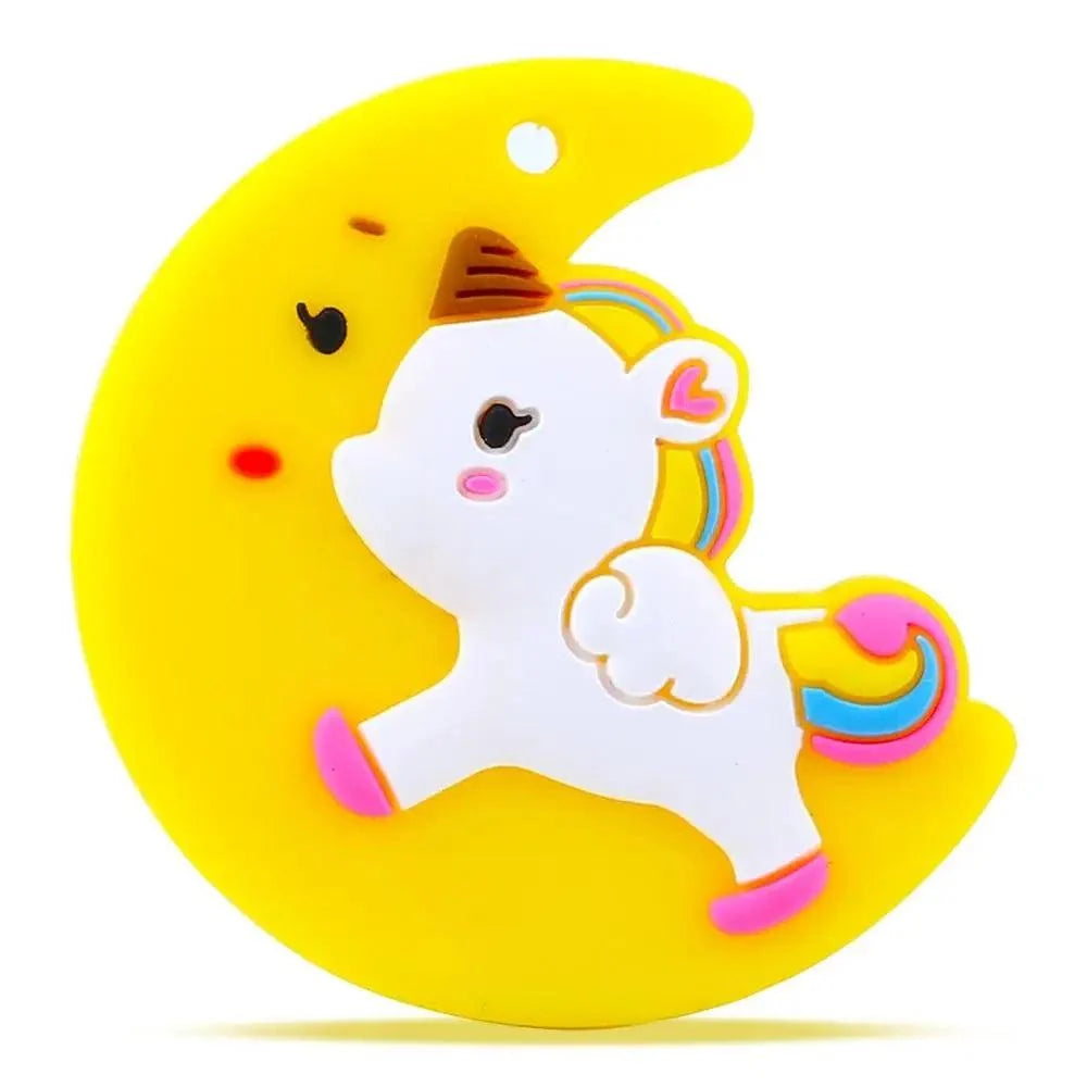 Unicorn silicone teether on a bright yellow crescent moon with pink hooves on Tampa Home & Garden Store