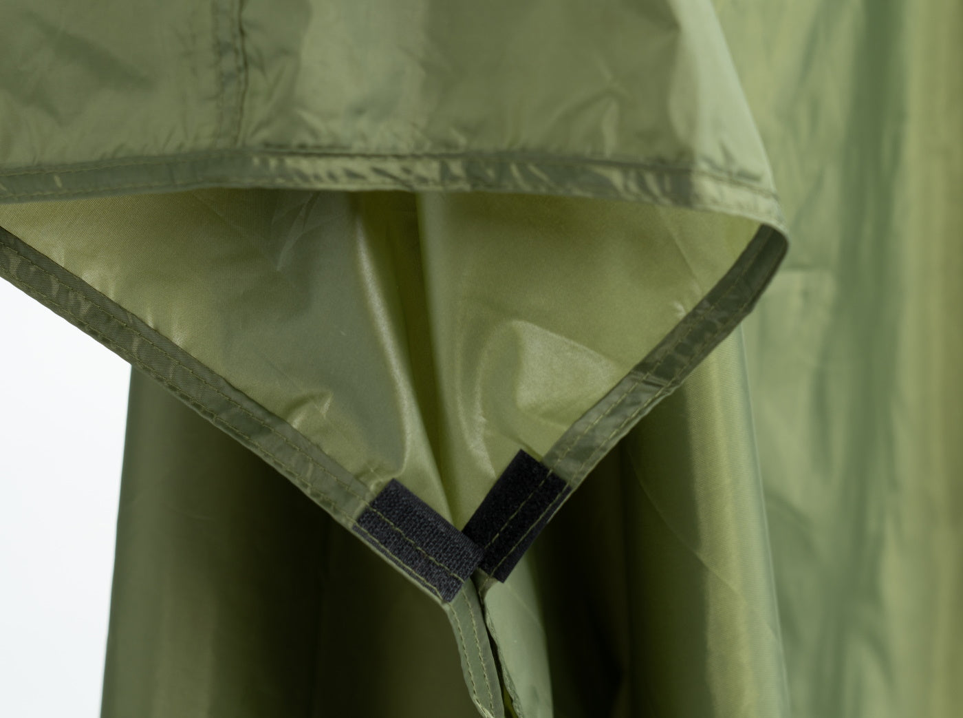 Poncho Rain Fly Tarp by River Country Gear in olive green nylon with black Velcro straps on Tampa Home & Garden Store