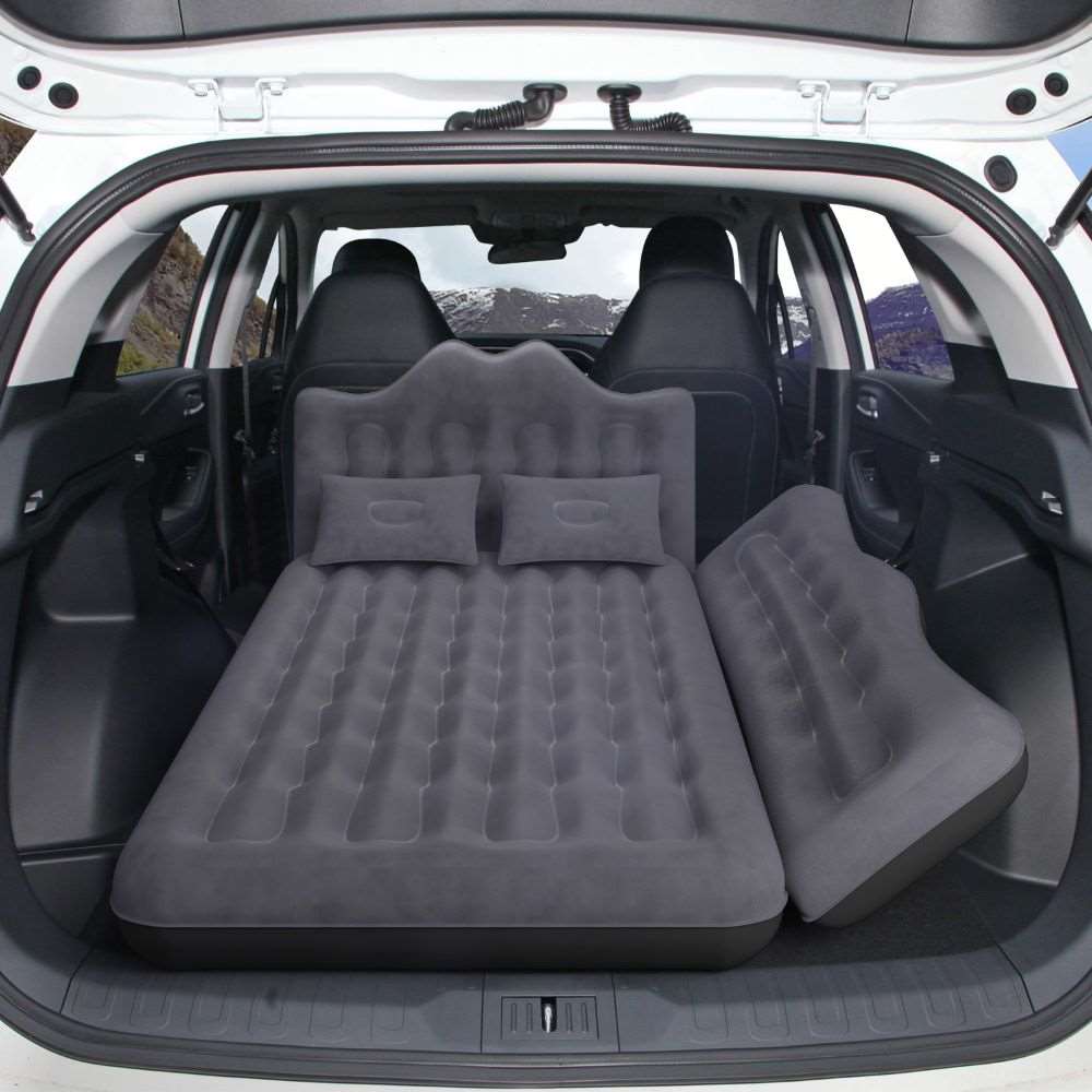 Umbrauto backseat air mattress in black with two pillows laid across SUV rear seats on Tampa Home & Garden Store