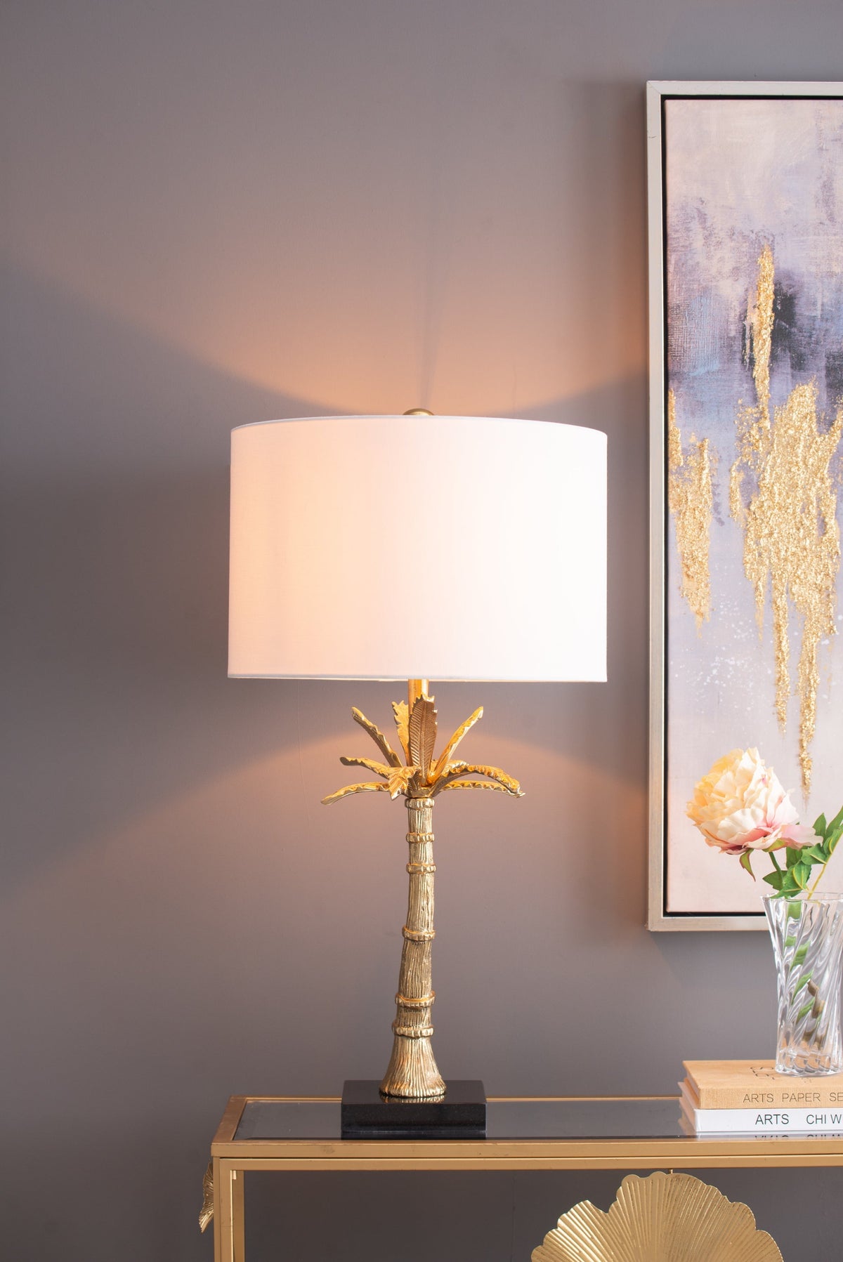 D16x31' Leaf Lamp with gold finish and leaf motif, white fabric shade, on a black pedestal base on Tampa Home & Garden Store