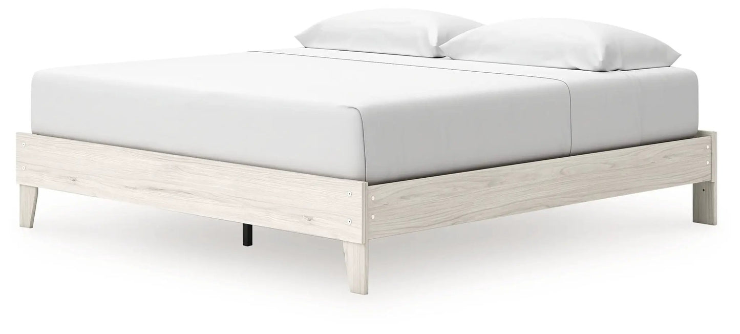 Socalle Platform Bed by Unique Piece Furniture, light wood frame with white bedding on Tampa Home & Garden Store