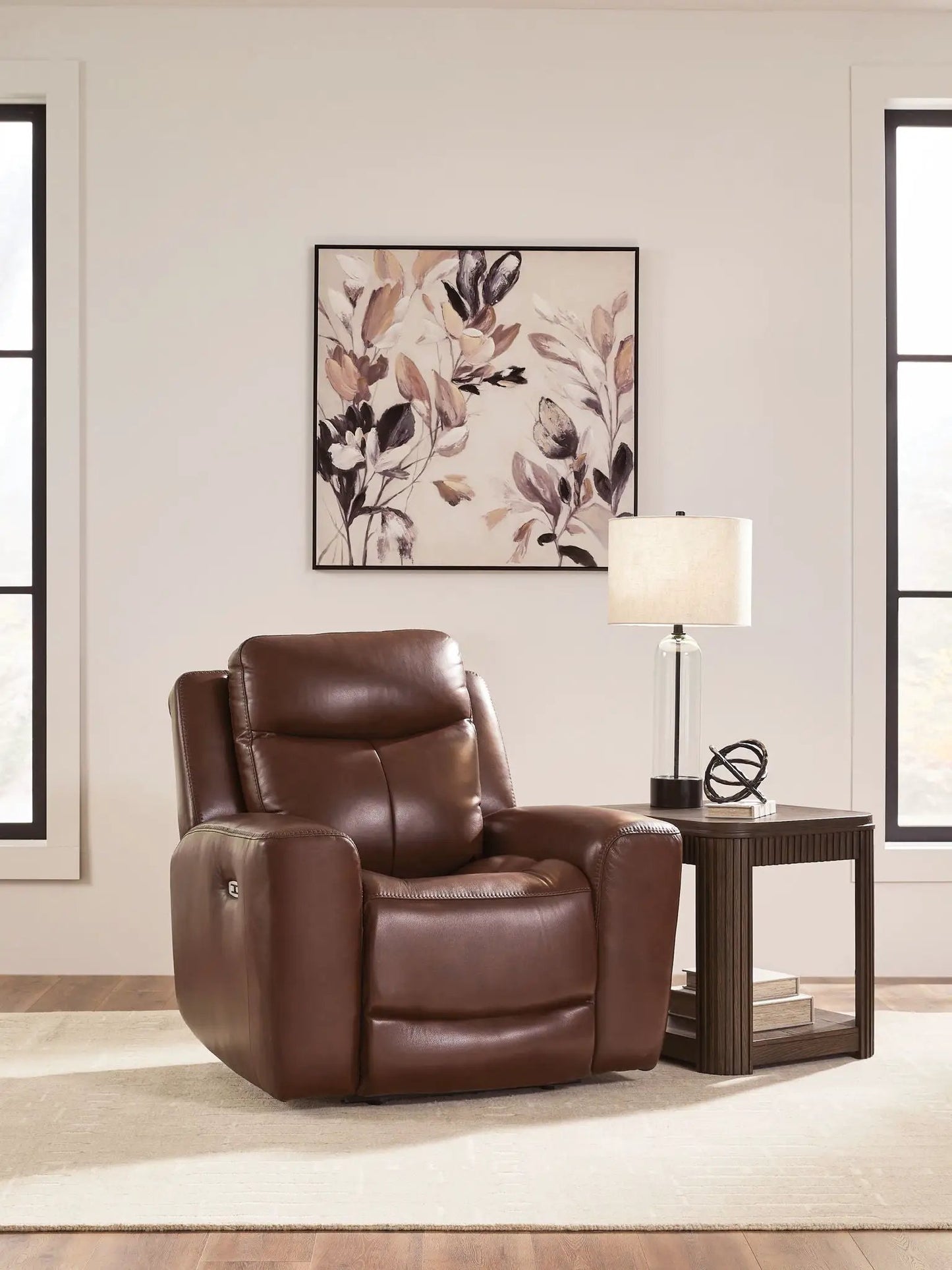 Bexhurst power recliner with adjustable headrest in brown leather, in a bright living room on Tampa Home & Garden Store