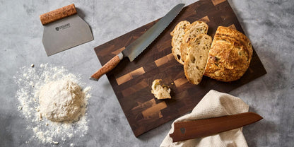 3-Piece Baker Set STEELPORT Knife Co. with wooden-handled bread knife on dark cutting board on Tampa Home & Garden Store