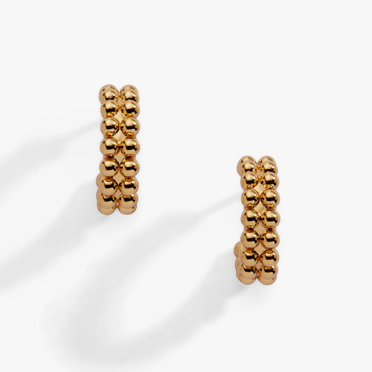Gold beaded huggie hoop earrings by ALEX AND ANI, pair with stacked spherical beads on Tampa Home & Garden Store