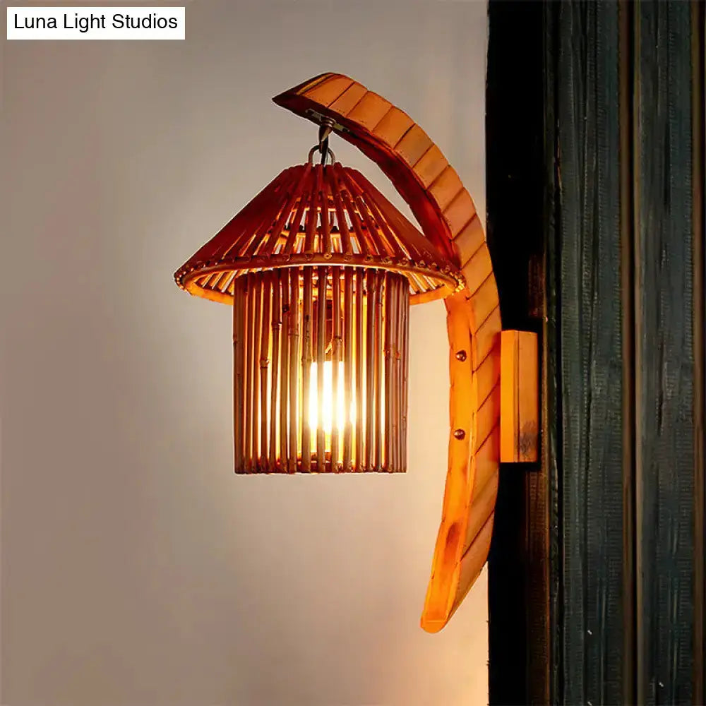 Decorbites bamboo country house arched wall sconce brown slatted shade with warm glow on Tampa Home & Garden Store