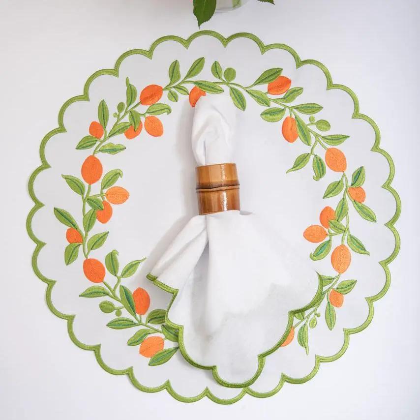Brazilian Bamboo Napkin Ring by Talah Home on white napkin with natural wood finish on Tampa Home & Garden Store