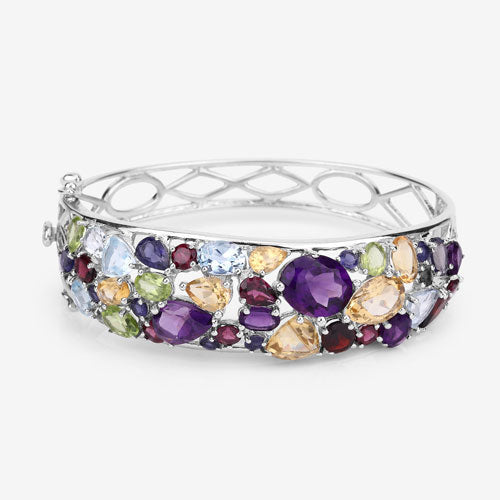 Bracelet: Sterling silver bangle with purple, peach, blue, and green gems by Bids.com on Tampa Home & Garden Store