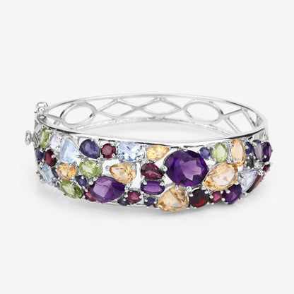 Bracelet: Sterling silver bangle with purple, peach, blue, and green gems by Bids.com on Tampa Home & Garden Store