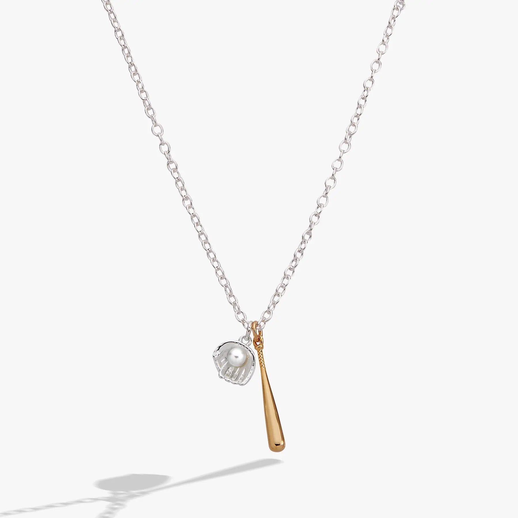 Ballgame Duo Charm Pendant Necklace by ALEX AND ANI; chain with a ball cage charm and gold-tone tassel on Tampa Home & Garden Store