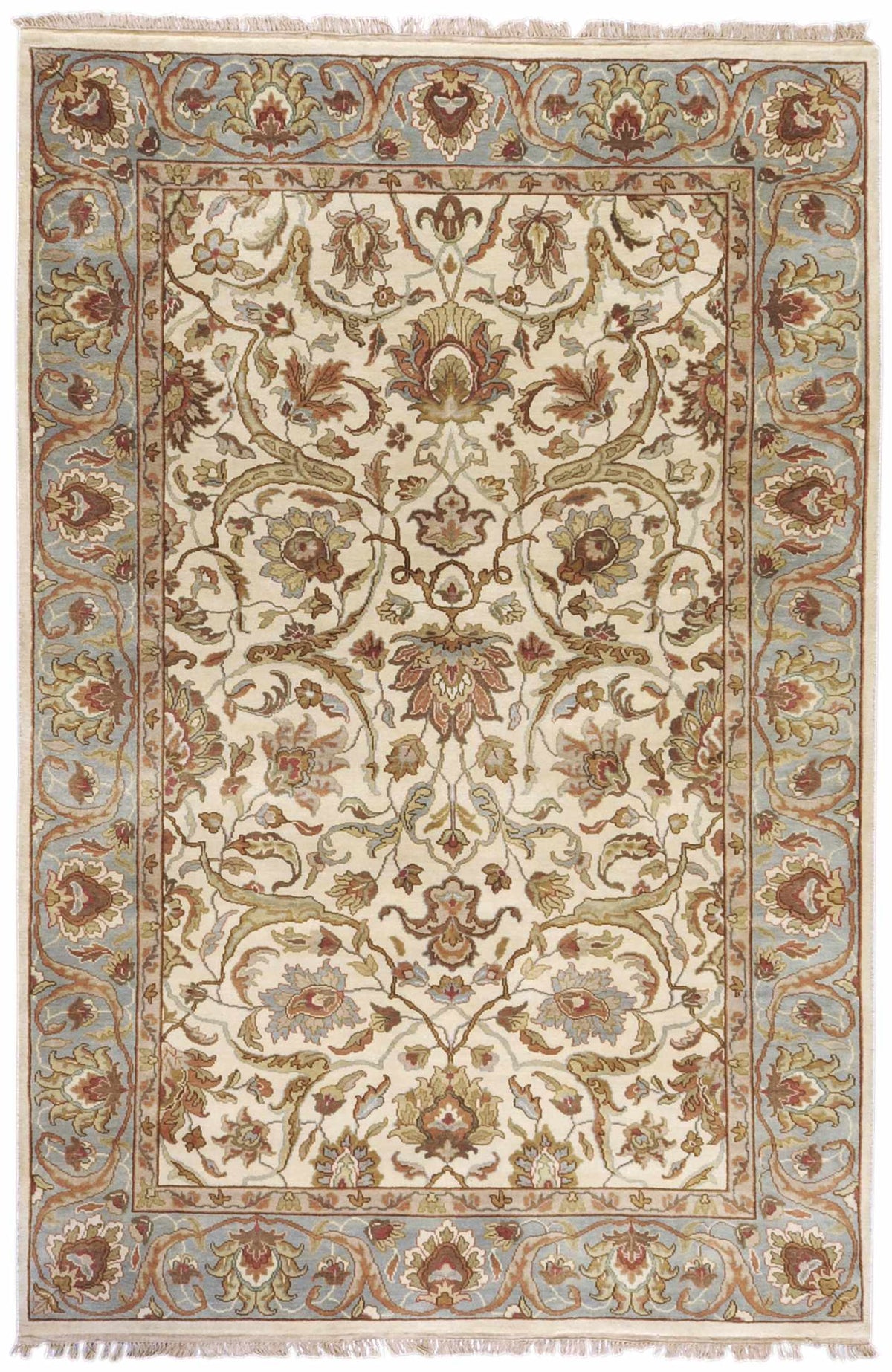 Baylis Area Rug by Boutique Rugs, cream field with blue border and floral motifs, fringe on Tampa Home & Garden Store