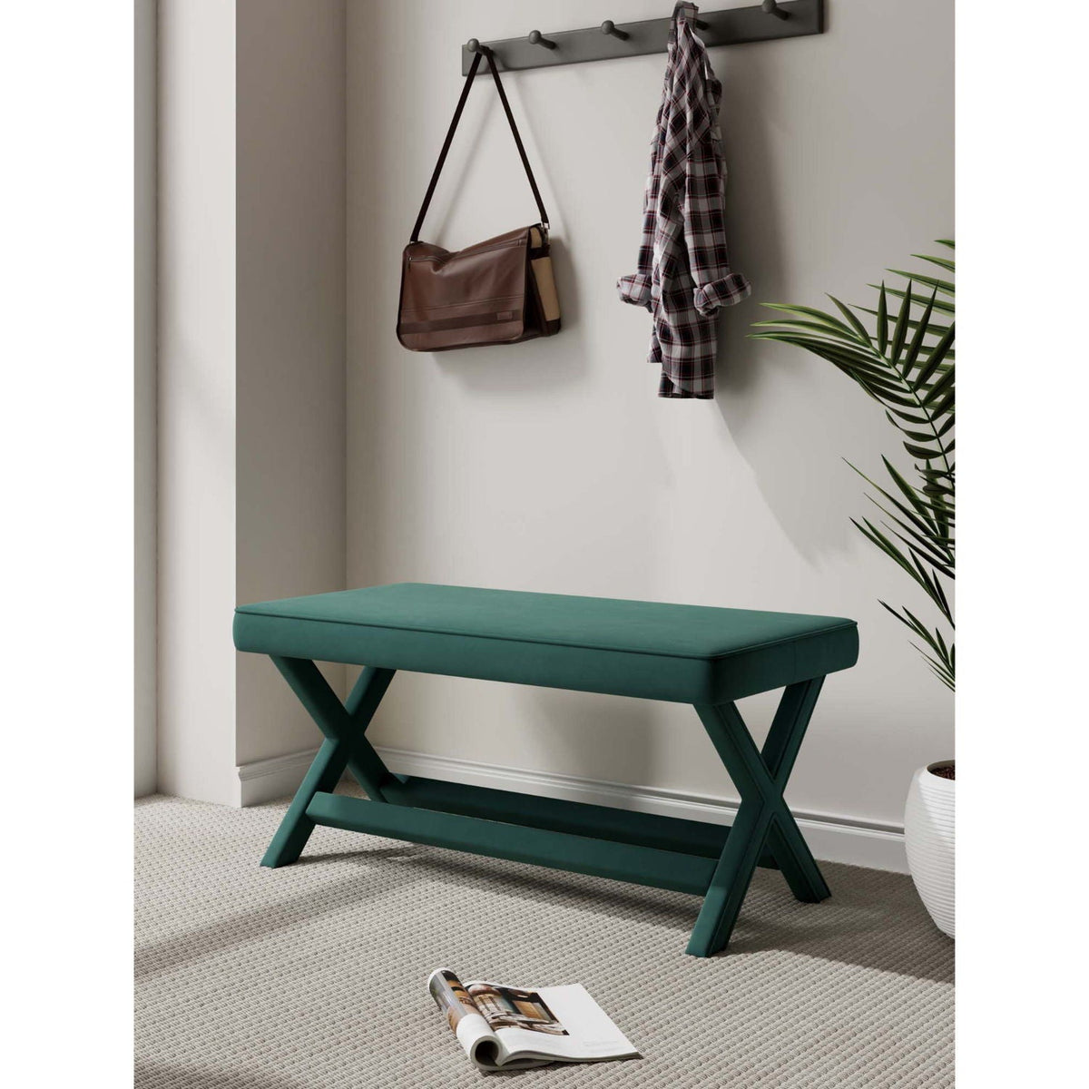 Accent bench with piped cushion and teal wood frame in entry; brown bag and plaid shirt nearby on Tampa Home & Garden Store