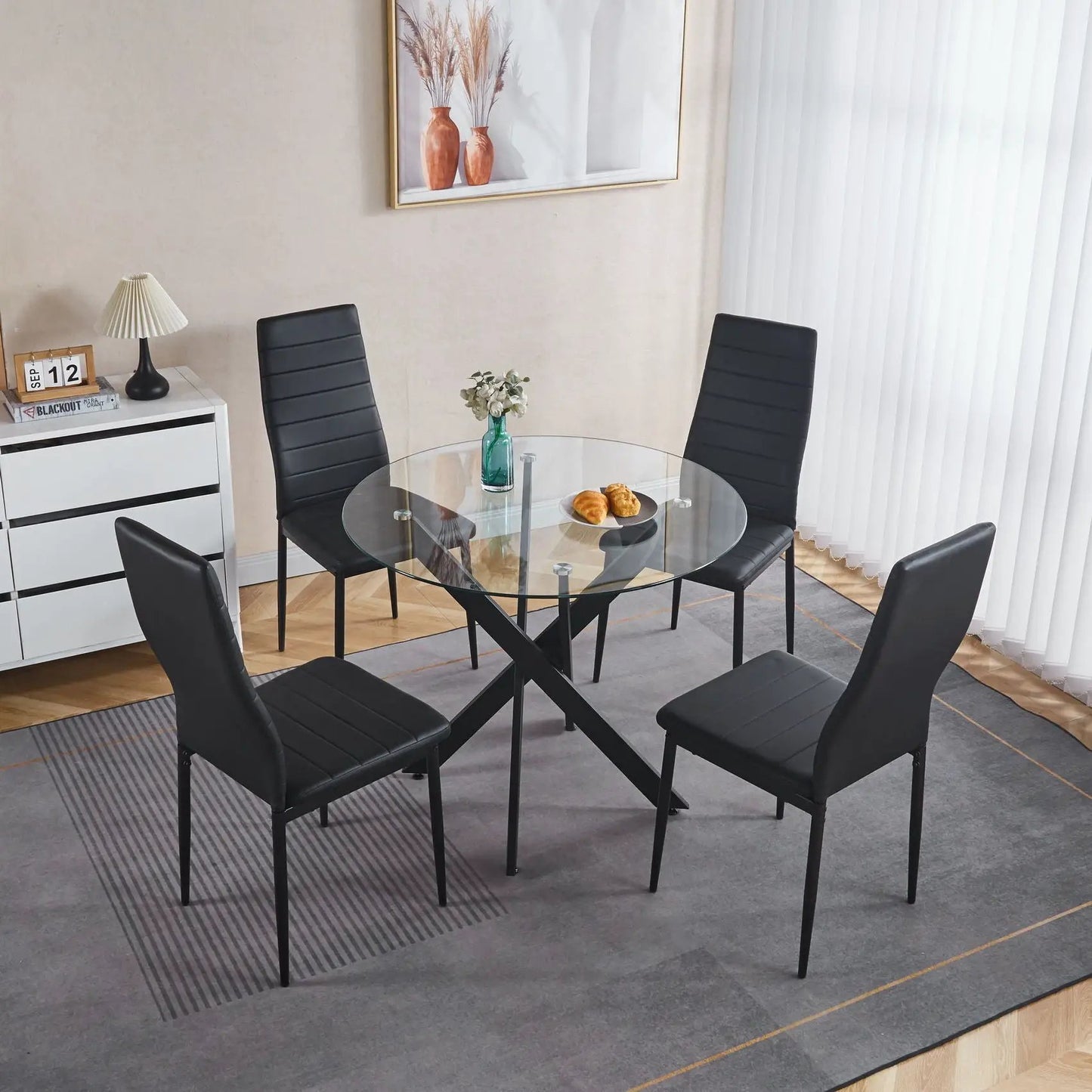 Dining Table with cross metal legs and tempered glass, 6 black upholstered chairs on Tampa Home & Garden Store