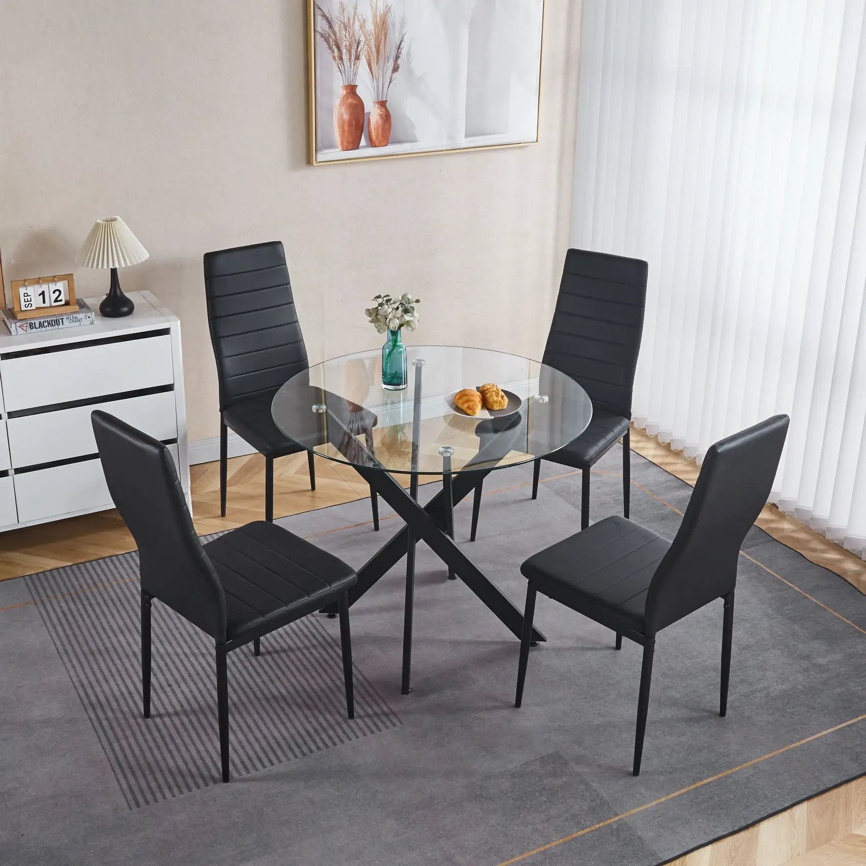 Dining Table with cross metal legs and tempered glass, 6 black upholstered chairs on Tampa Home & Garden Store