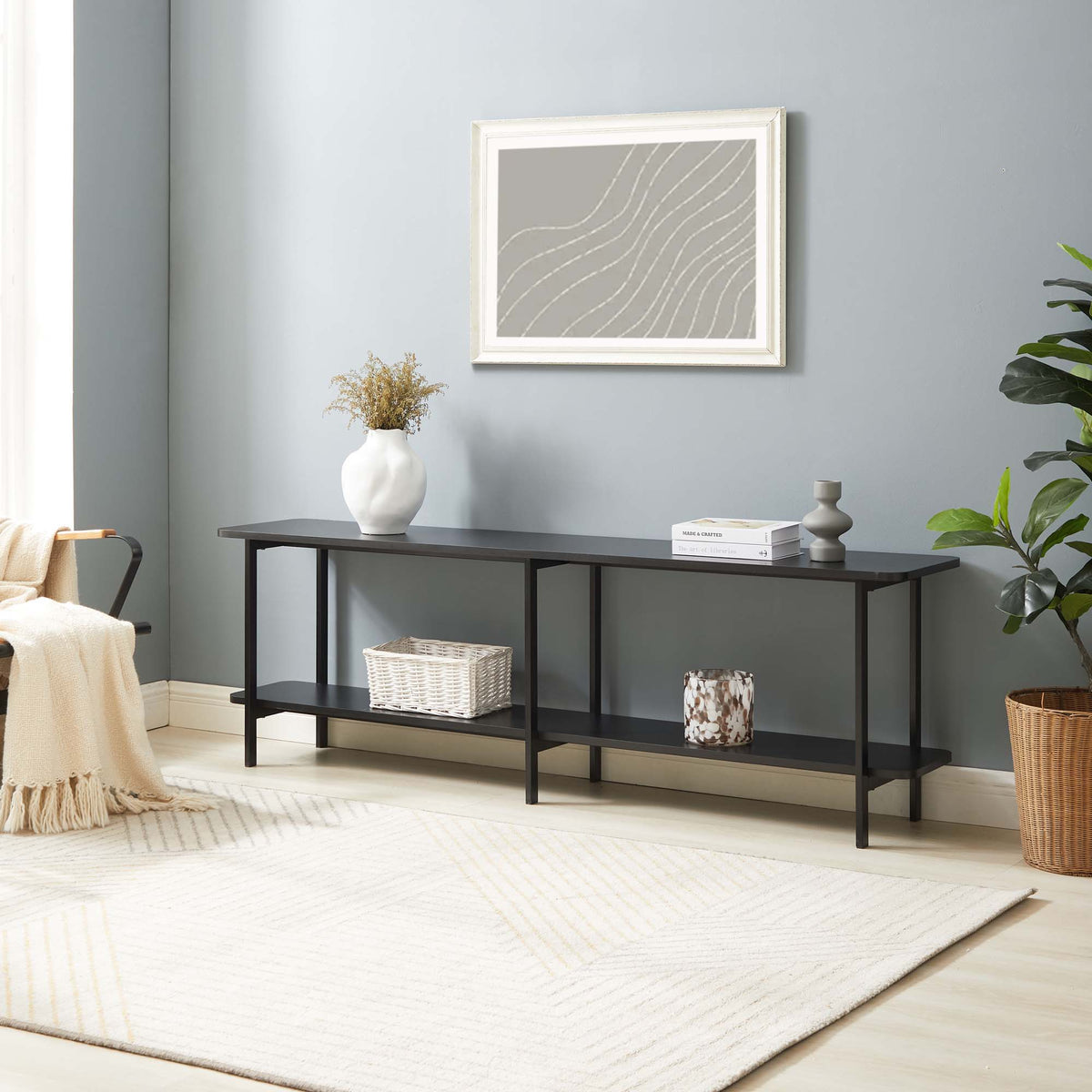 Celine 2 Shelf Console Table in black metal with white vase and books decor on Tampa Home & Garden Store