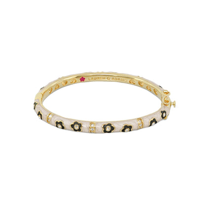 Flower Girl Bangle by Lauren G Adams in gold tone with black enamel flowers and crystal accents on Tampa Home & Garden Store