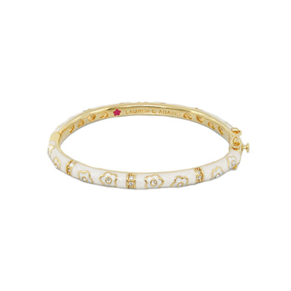 Flower Girl Bangle by Lauren G Adams, gold-tone bracelet with white enamel floral pattern and crystal accents on Tampa Home & Garden Store