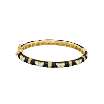 Petite Butterfly Bangle by Lauren G Adams in black enamel with butterfly motif and gold trim on Tampa Home & Garden Store