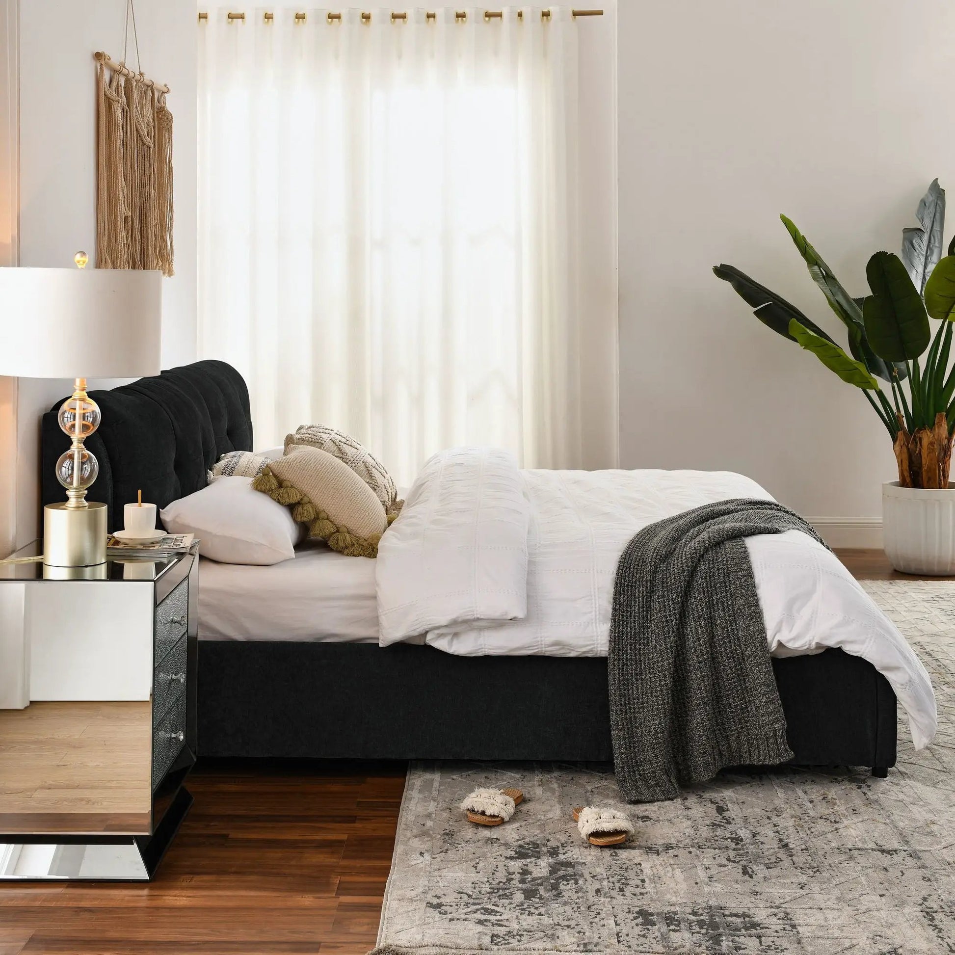 Storage upholstered hydraulic platform bed with integrated headboard in black fabric on Tampa Home & Garden Store