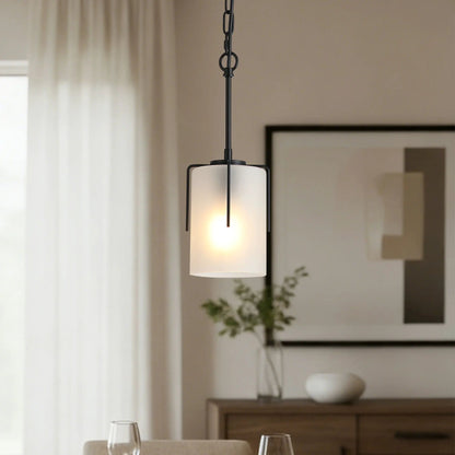 Adjustable cylindrical pendant light with black metal frame and frosted glass shade on Tampa Home & Garden Store