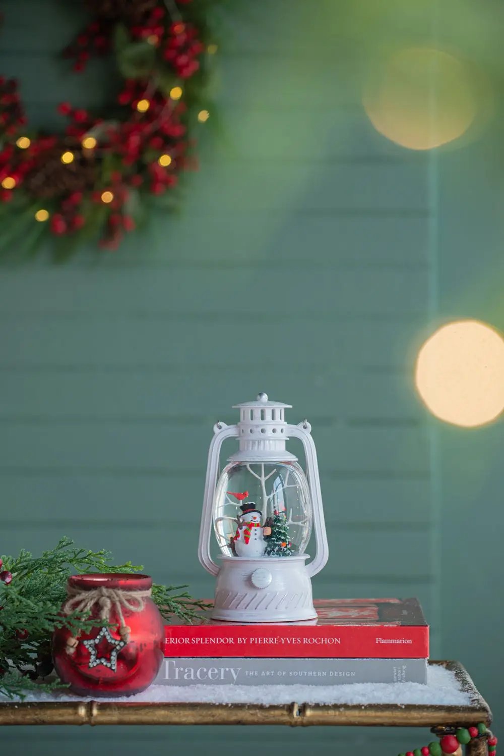 White plastic lantern with snowman and Christmas tree water spinning LED scene on Tampa Home & Garden Store
