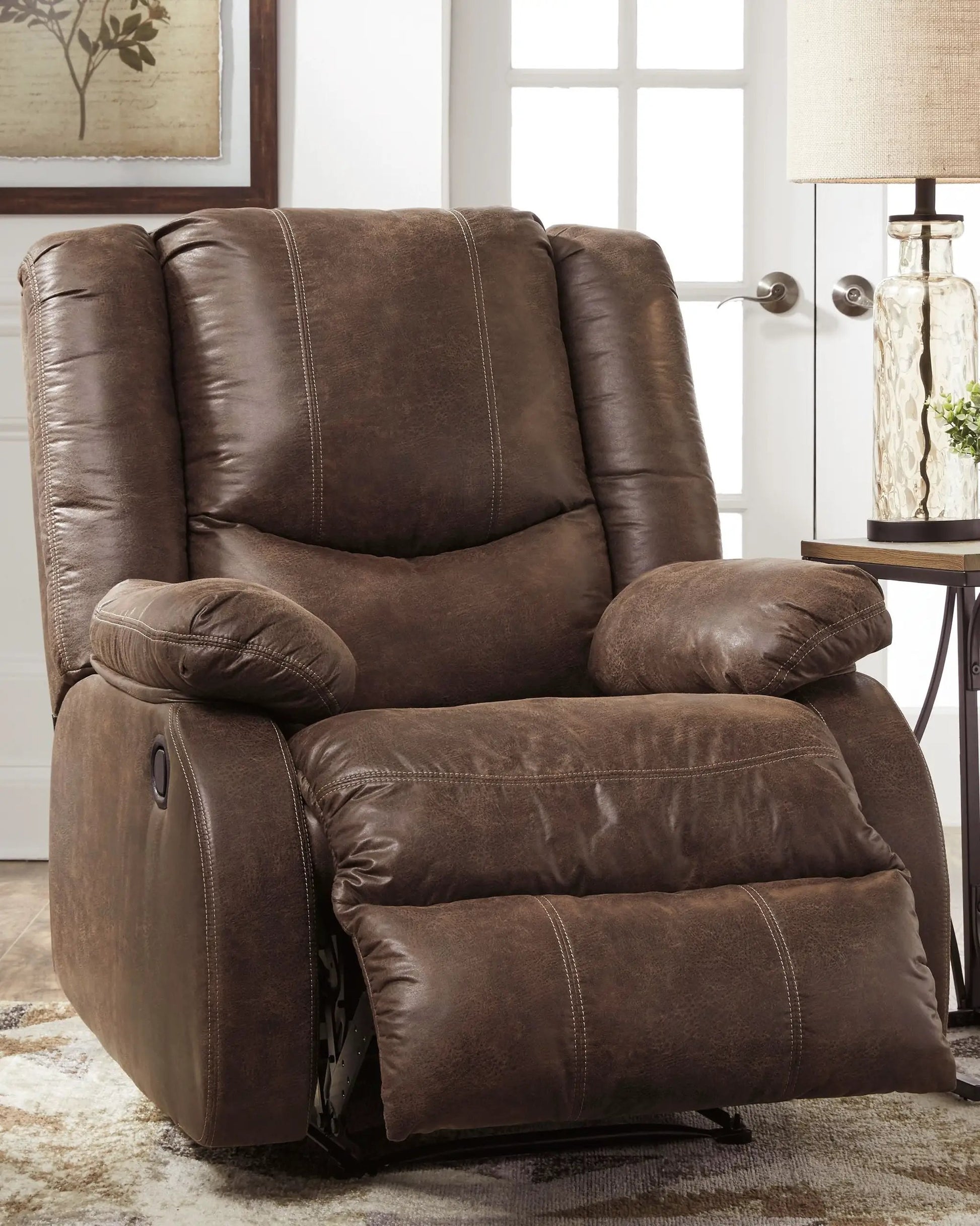 Bladewood recliner in brown leather with contrast stitching and plush padded arms on Tampa Home & Garden Store