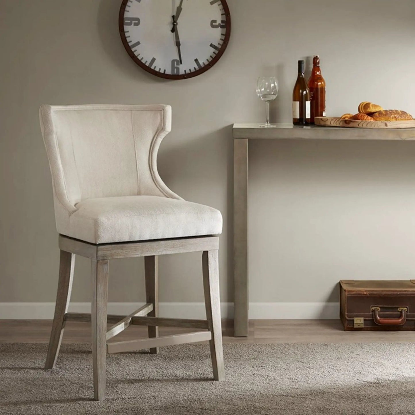 Carson counter stool with swivel seat, beige upholstery, weathered wood legs on Tampa Home & Garden Store