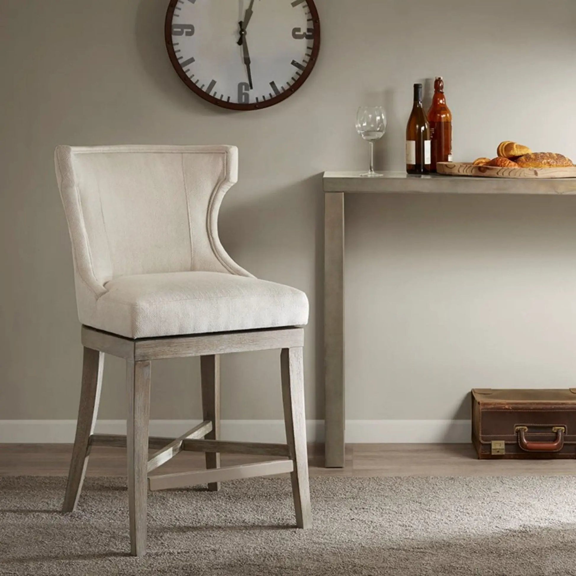 Carson counter stool with swivel seat, beige upholstery, weathered wood legs on Tampa Home & Garden Store