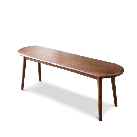 Dining bench in warm wood with rounded ends and tapered legs on Tampa Home & Garden Store