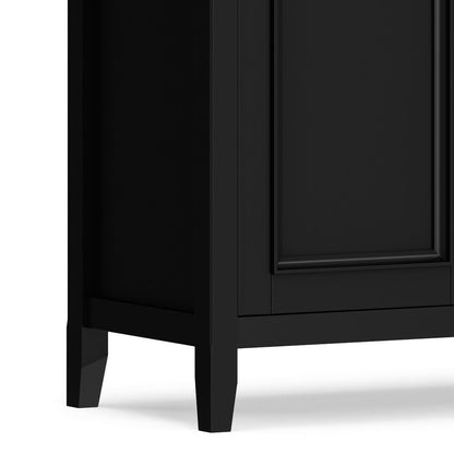 Amherst 4-Door Storage Cabinet black with paneled doors and tapered legs on Tampa Home & Garden Store