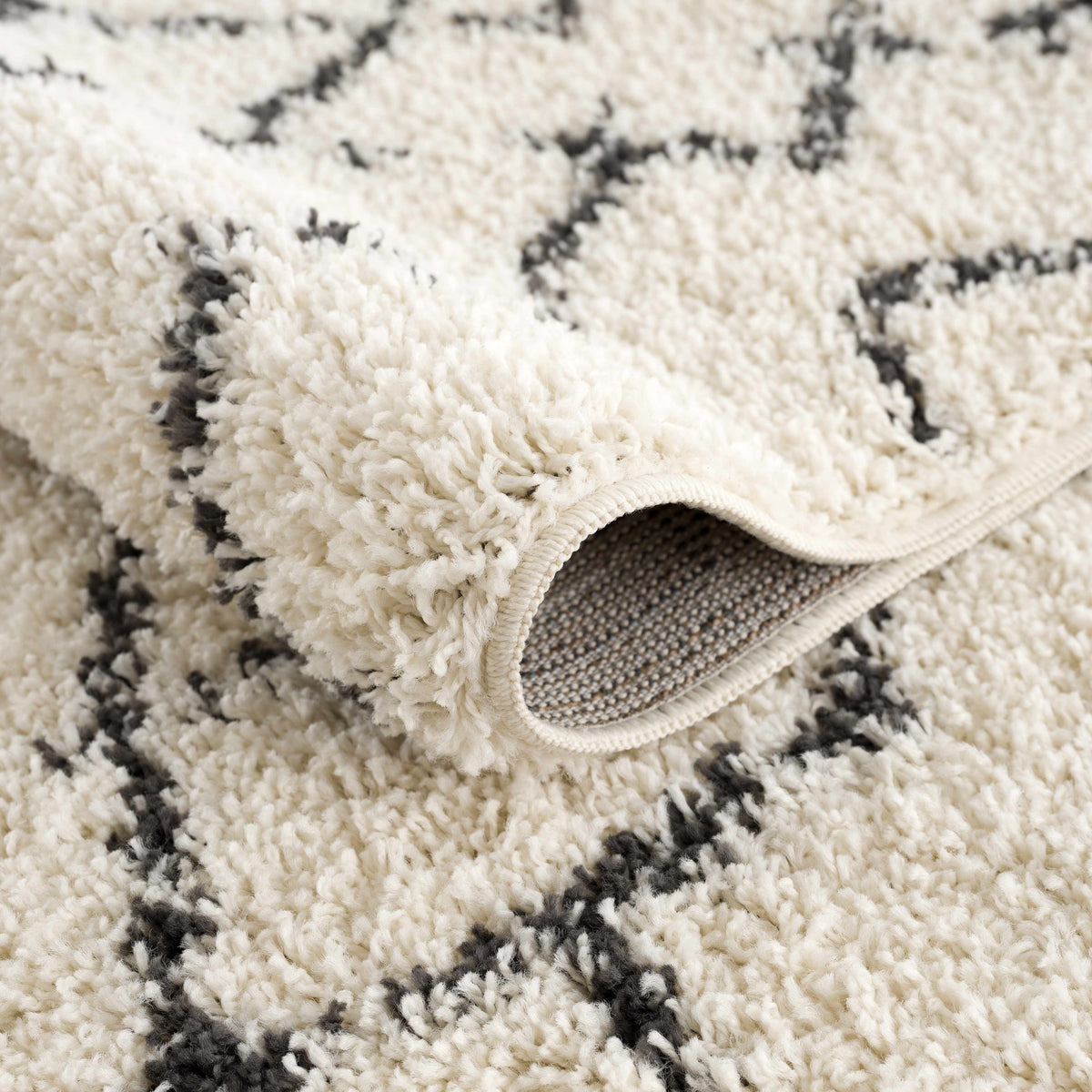 Pahala Moroccan Shag Area Rug cream with black geometric accents by Boutique Rugs on Tampa Home & Garden Store