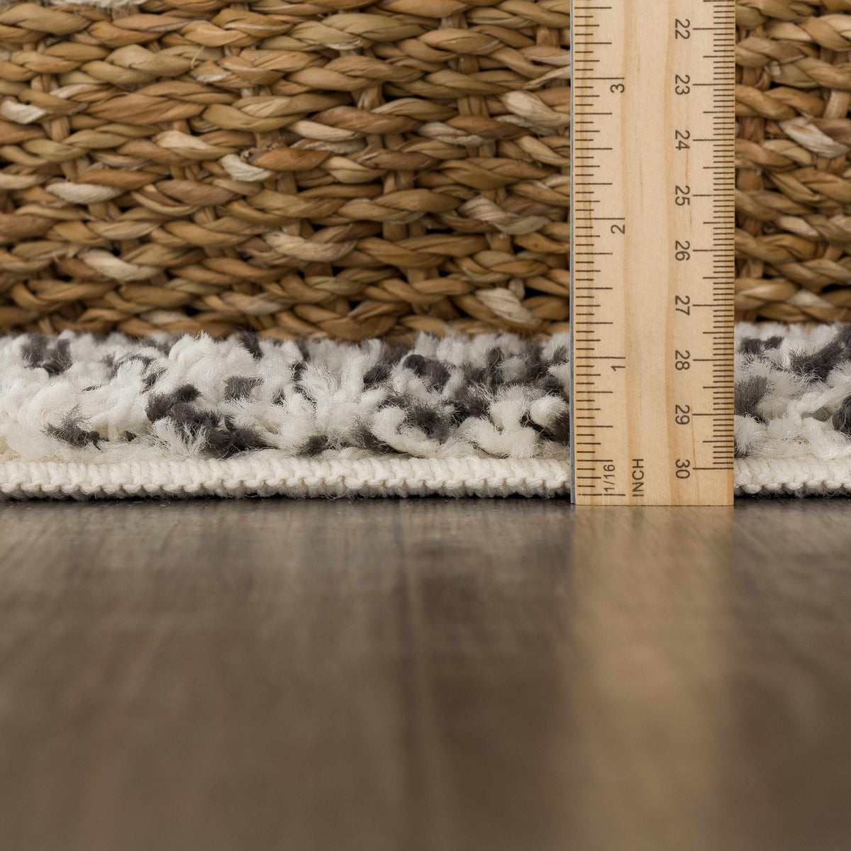 Buan area rug natural beige braided jute texture with inch scale ruler Boutique Rugs on Tampa Home & Garden Store