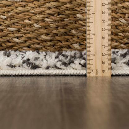 Buan area rug natural beige braided jute texture with inch scale ruler Boutique Rugs on Tampa Home & Garden Store