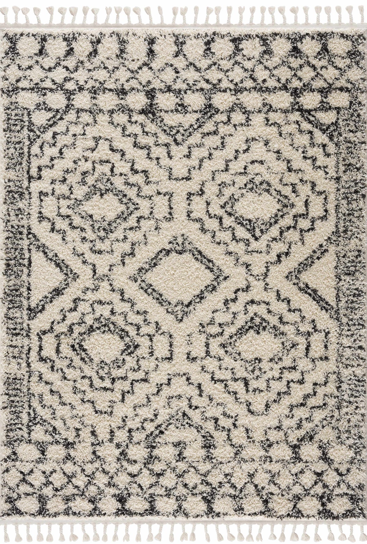 Buan area rug beige with dark charcoal lattice pattern and tassel fringe on Tampa Home & Garden Store