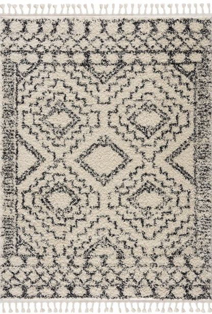 Buan area rug beige with dark charcoal lattice pattern and tassel fringe on Tampa Home & Garden Store