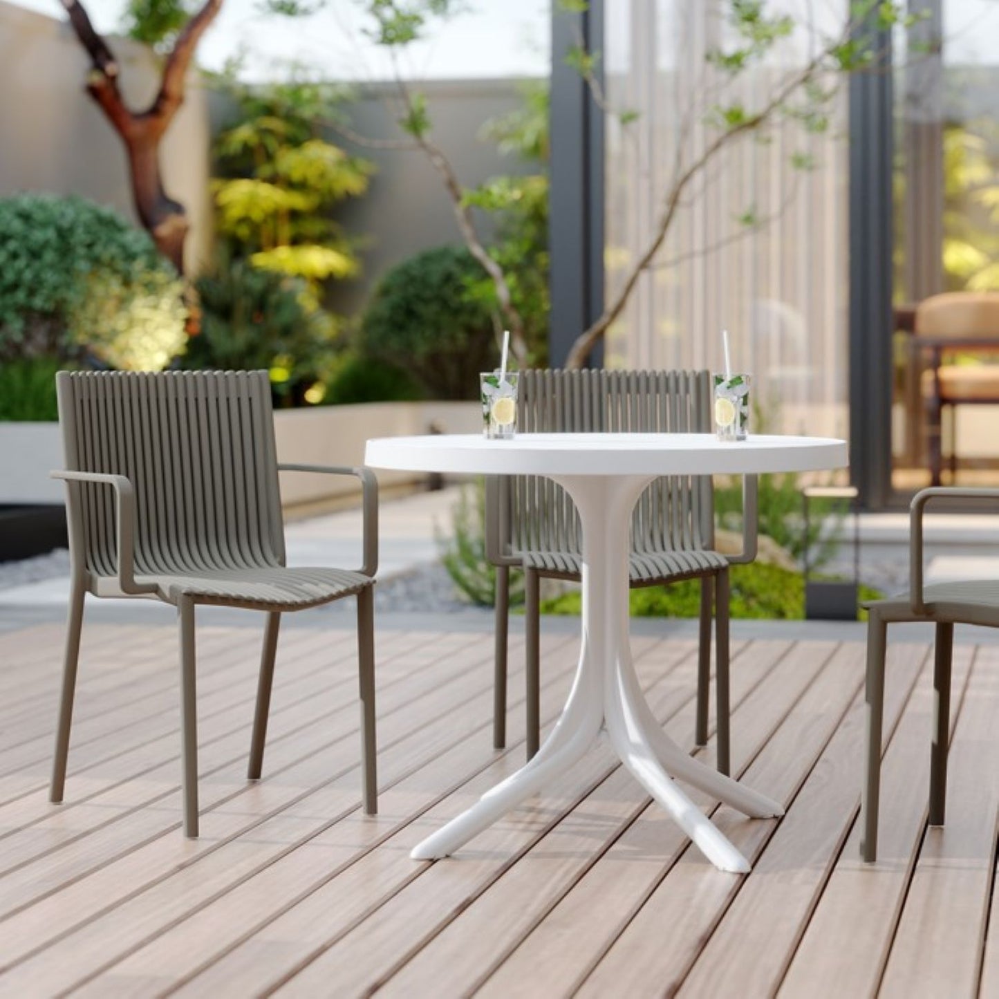 4 Stackable Plastic Chairs and Round Table