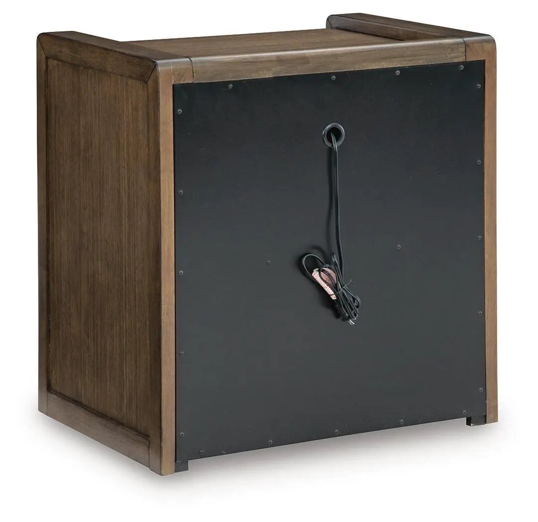 Marxmore Three Drawer Night Stand in brown wood with black back panel and exposed cord on Tampa Home & Garden Store