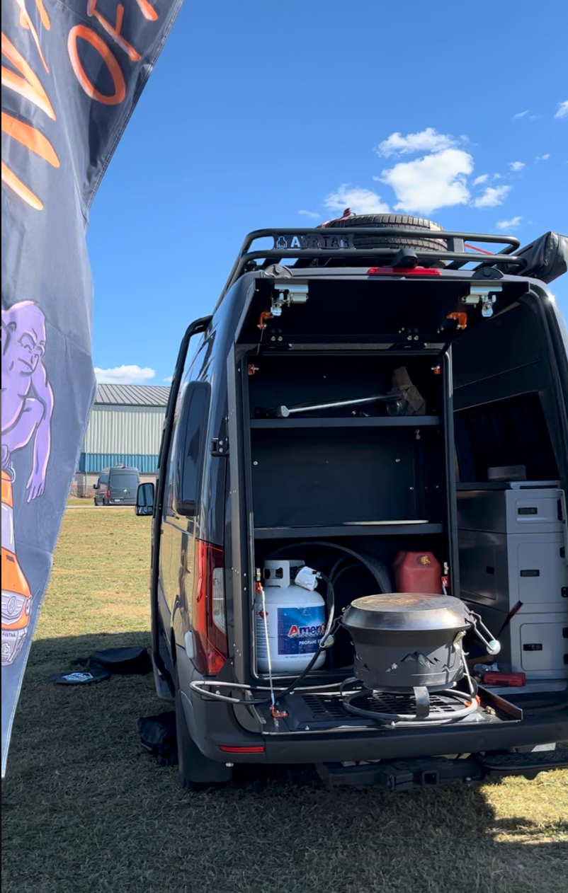 Avatar offroad Giga Largest Storage Box, black van interior with shelves and propane tank setup on Tampa Home & Garden Store