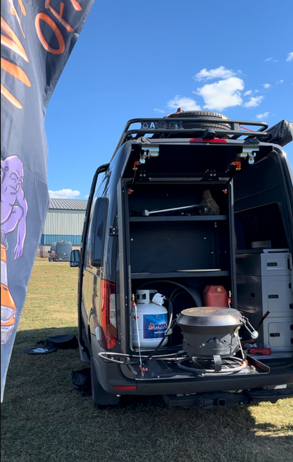 Avatar offroad Giga Largest Storage Box, black van interior with shelves and propane tank setup on Tampa Home & Garden Store