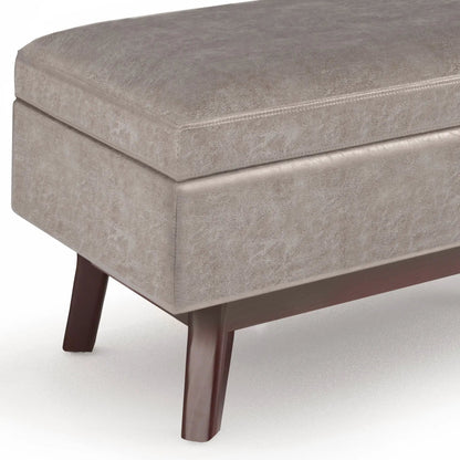 Owen upholstered rectangular storage ottoman in beige fabric with dark wood legs on Tampa Home & Garden Store