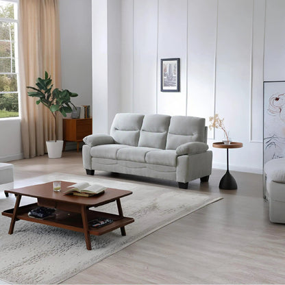 Summerton sofa with pillow-top arms in light gray fabric sits in a modern living room on Tampa Home & Garden Store