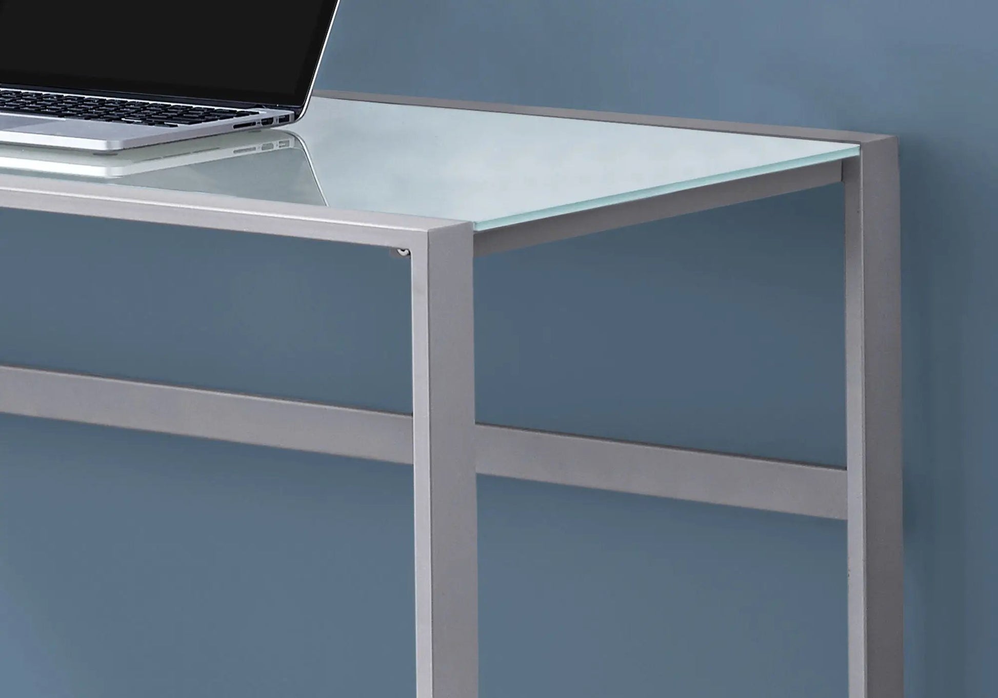 Computer desk glass top with silver metal frame; laptop on left, Unique Piece Furniture on Tampa Home & Garden Store