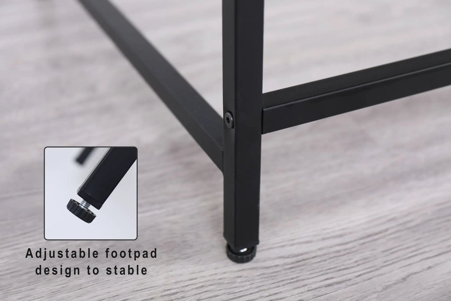 Narrow black metal console table with adjustable footpads for entryways on Tampa Home & Garden Store