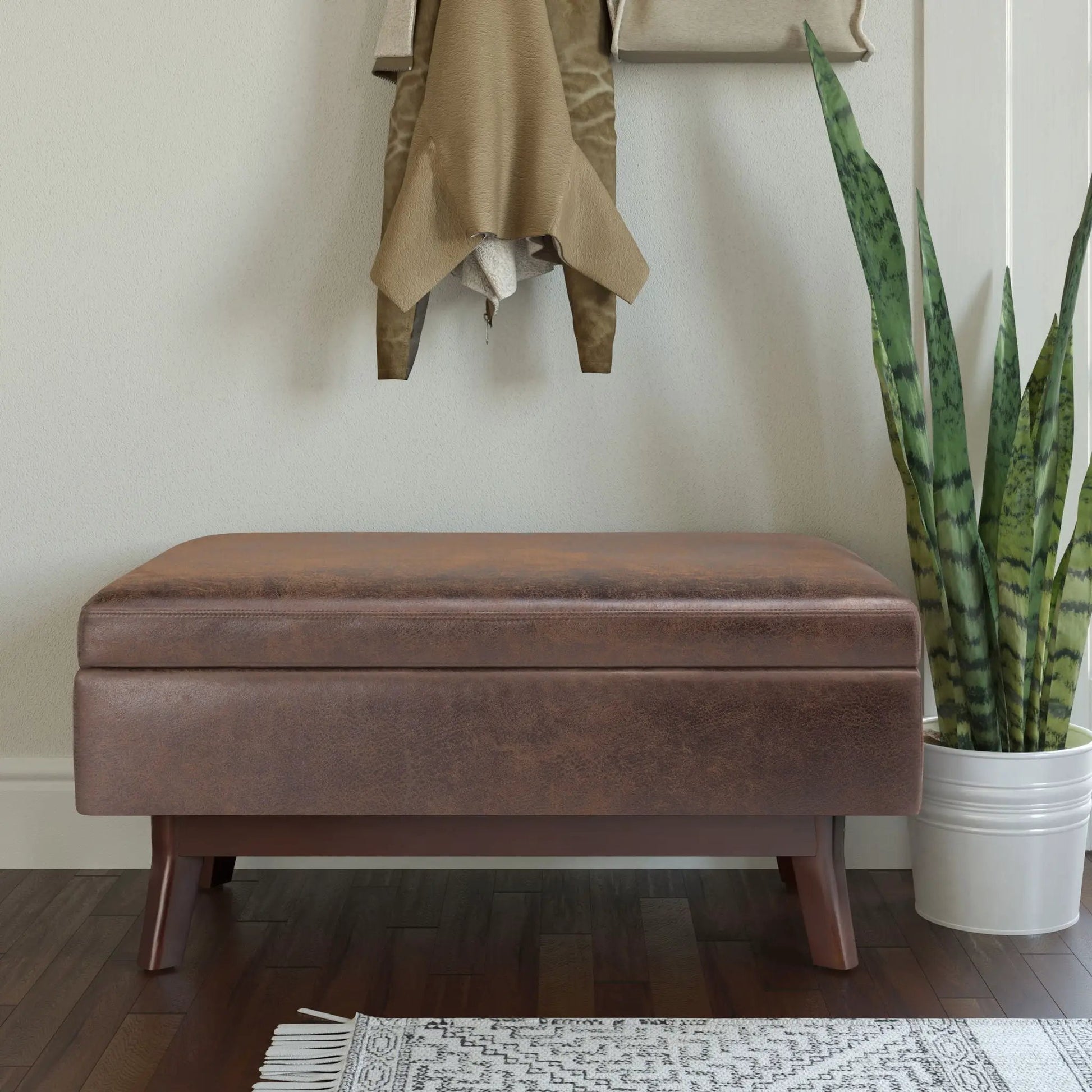 Owen upholstered rectangular storage ottoman brown faux leather with legs Unique Piece Furniture on Tampa Home & Garden Store