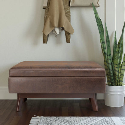 Owen upholstered rectangular storage ottoman brown faux leather with legs Unique Piece Furniture on Tampa Home & Garden Store