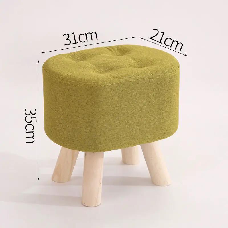 Nordic solid wood fabric ottoman stool with tufted olive-green cushion and wooden legs on Tampa Home & Garden Store