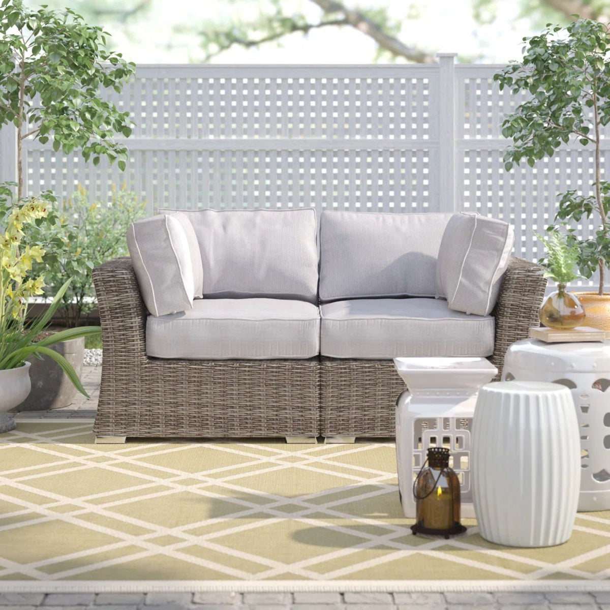 Outdoor loveseat with light gray cushions, all-weather wicker frame by HouseOfZazla on Tampa Home & Garden Store